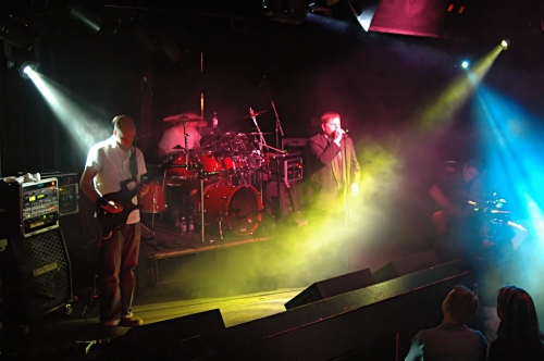 White, Yellow and Blue beamy shot of Counterfist.  John Schlick was the Lighting Designer for this show.